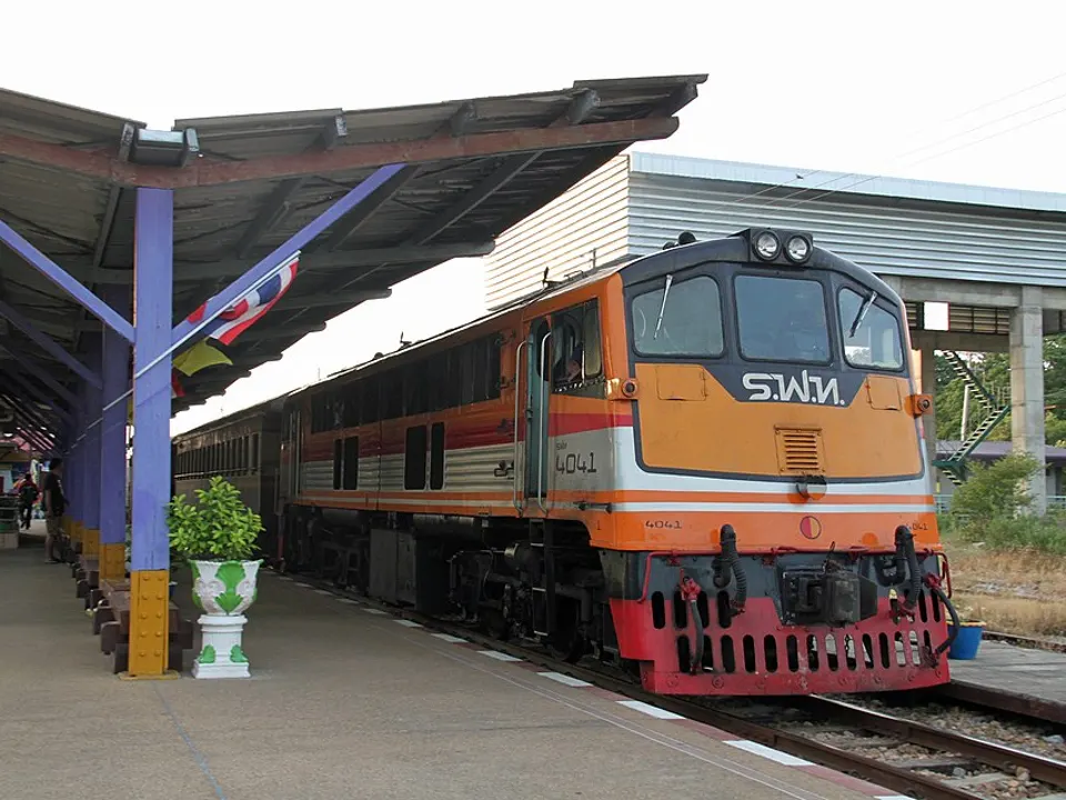 A State Railway of Thailand train waiting at a platform