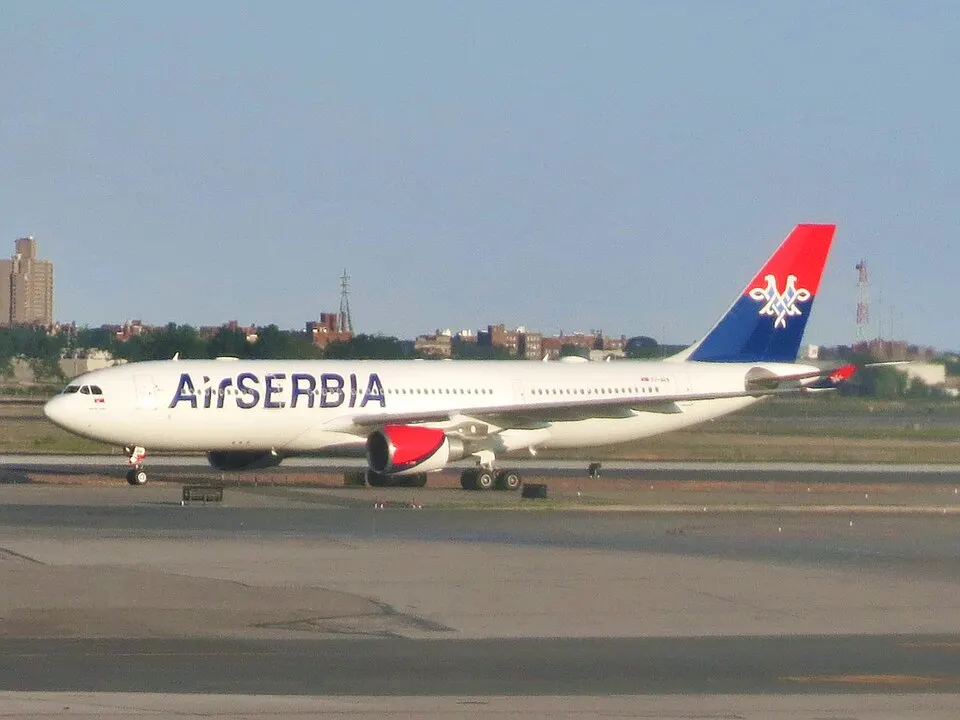 An Air Serbia Airbus A330 taxiing at an airport